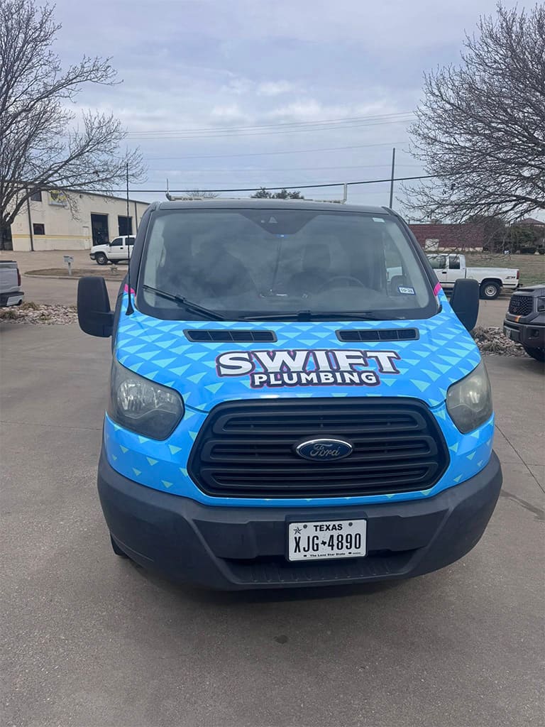 Swift Plumbing service van returning from heath tx water heater project